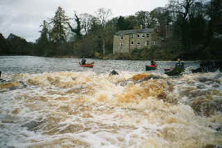 Grade 3 at Haughton Castle, Barrasford. Sharp boulders to avoid. Alternative route river right.