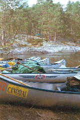 Canodal canoes ashore.